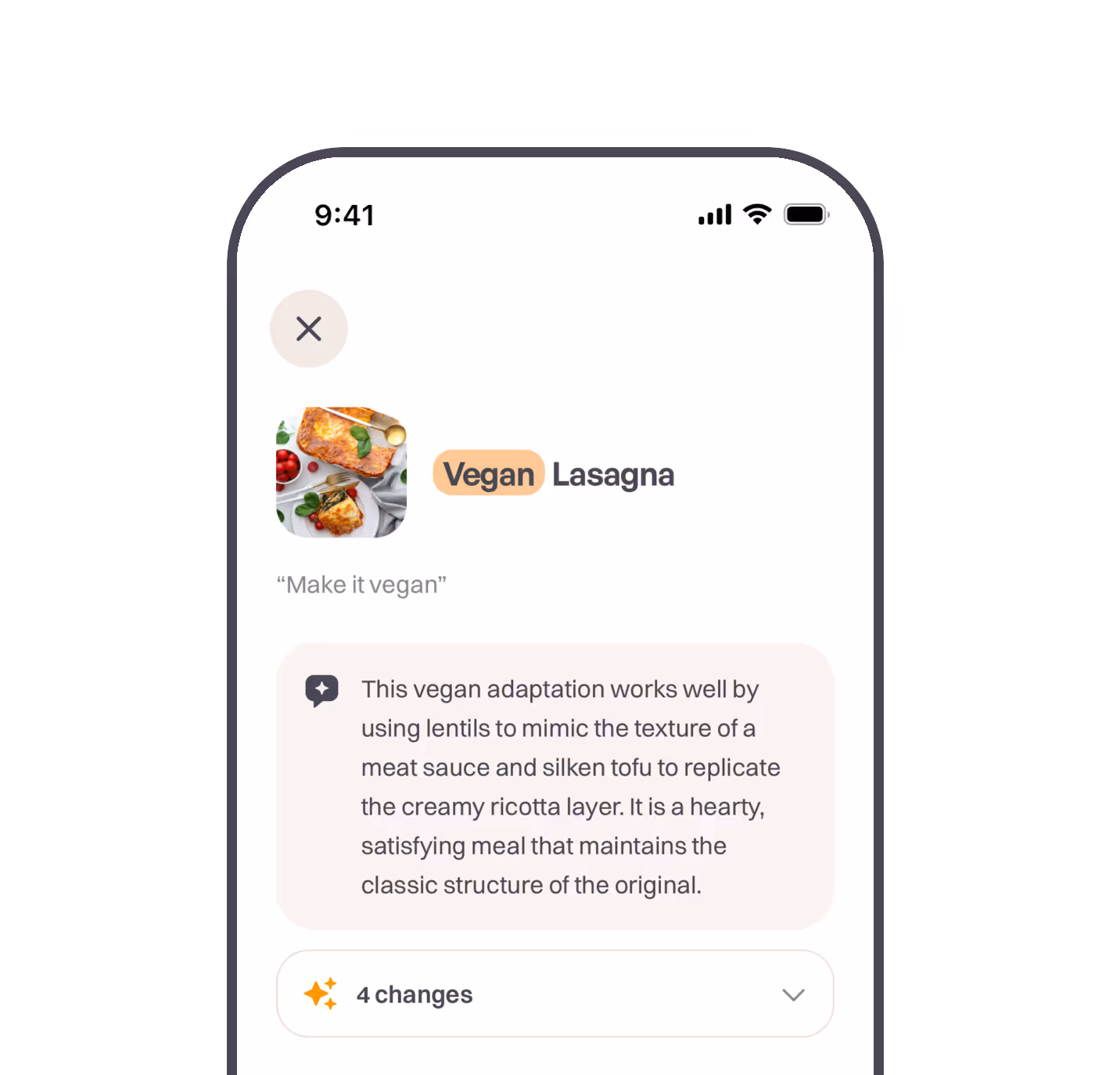 MealBuddy app showing a beef lasagna adapted into a vegan version, with Buddy's comment on the change and a summary of what changed